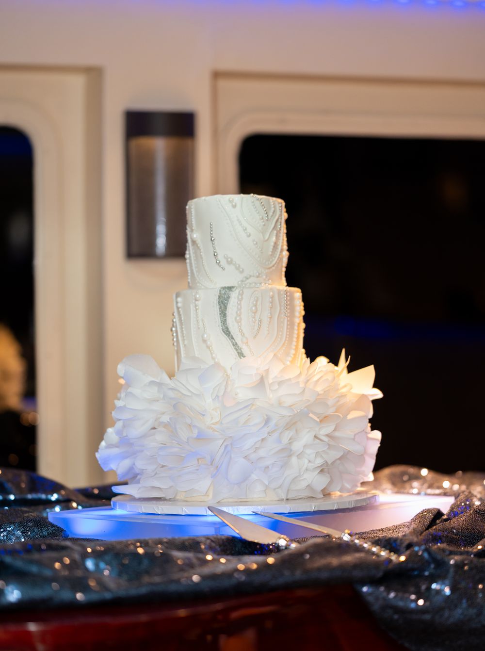 Candles and lanterns decorating yacht wedding reception tables