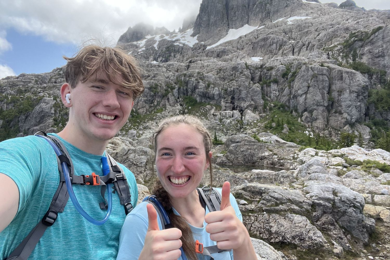 Katie Phillips (Soulfull Photographs) the photographer on Triple Peak giving a thumbs up with her brother