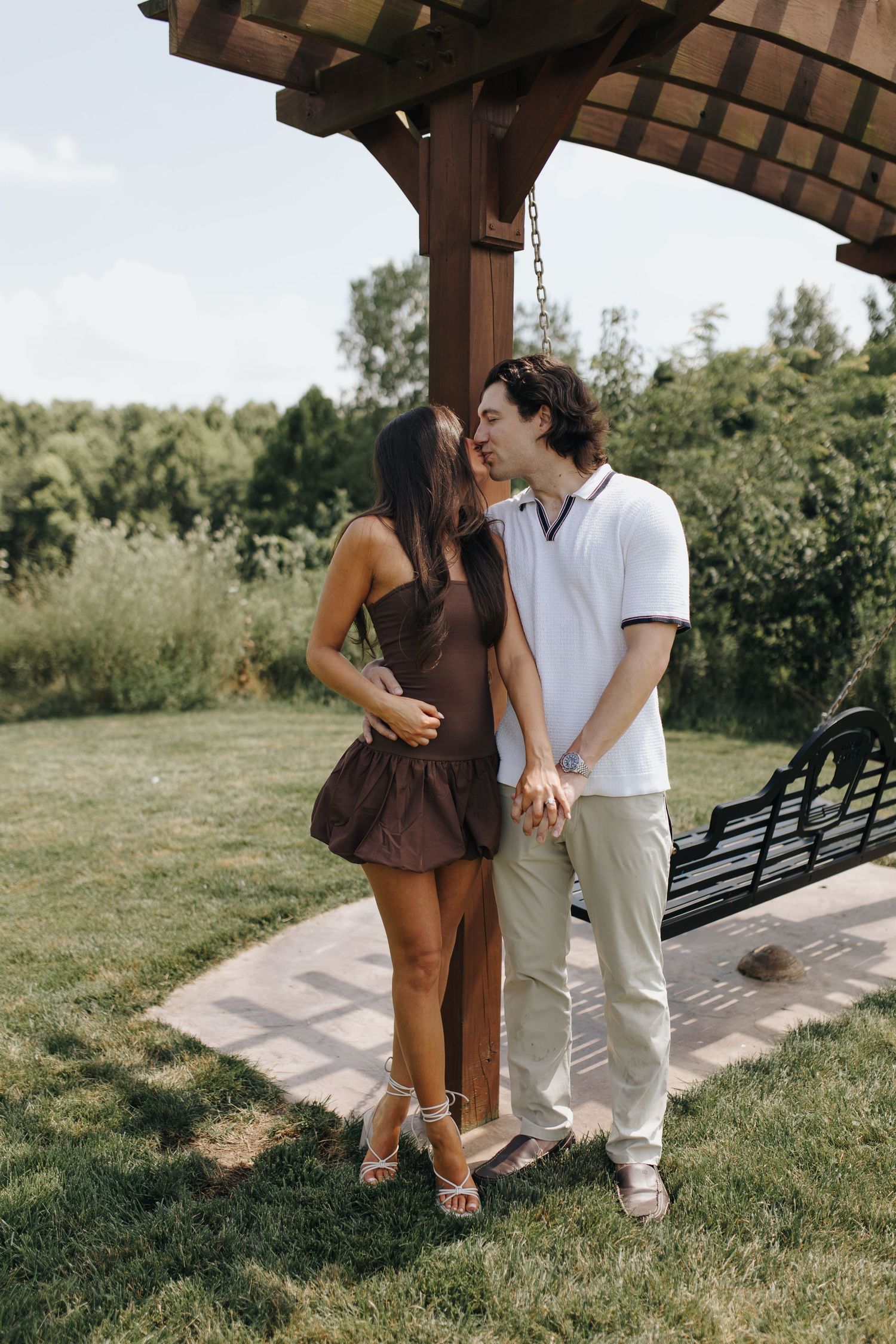 Brooke and Martin sharing a kiss moments after Martin's proposal at the River Bluff at High Banks Metro Park in Columbus, Ohio.