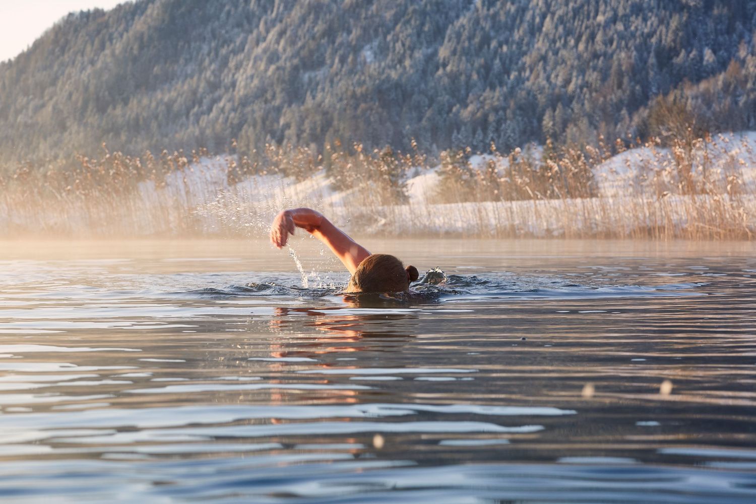 Landscape photography, cold-water swimmer. Location: Unteraegeri, CH. Photo by Dayle Prowse.