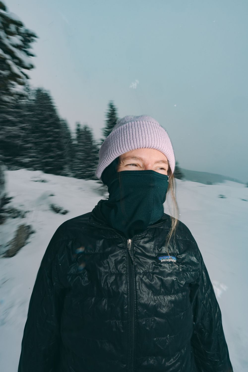 a woman in a black jacket and hat stands in the snow
Photographer: Urban Engel Perspectiva