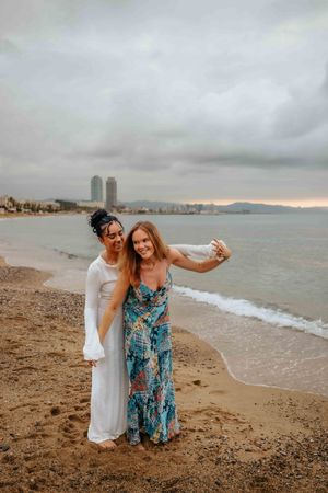 Mediterranean couple photoshoot on Barceloneta Beach in Barcelona
