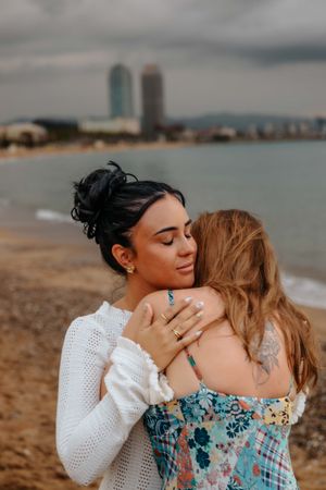 Soft morning light couple portraits on Barceloneta Beach