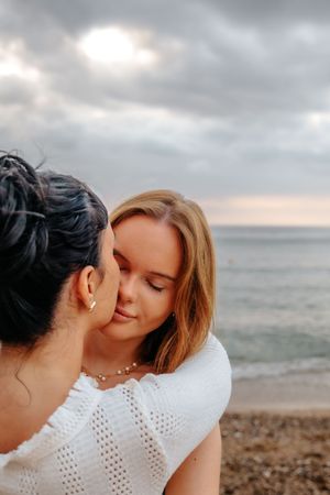 Couple enjoying a quiet morning on Barceloneta Beach in Barcelona