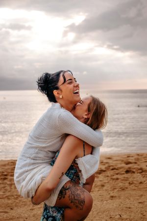 Intimate couple photoshoot in Barceloneta Beach, Barcelona
