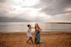 Sunrise couple portraits on Barceloneta Beach with Mediterranean vibes