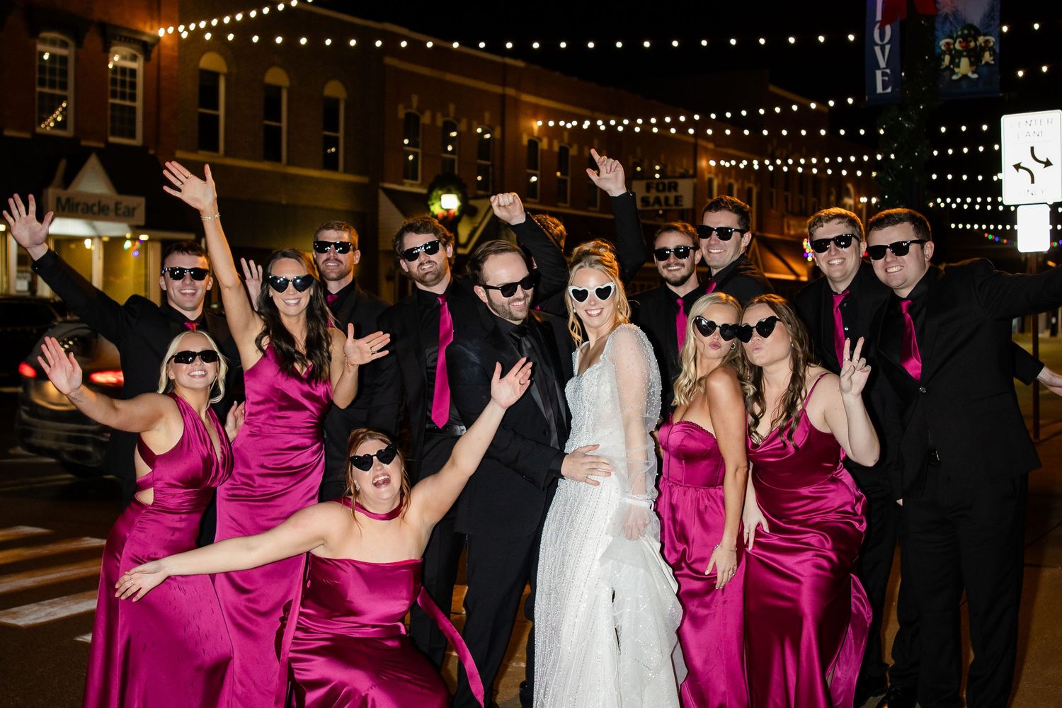 Black and white wedding photos showing intimate romantic moments during an outdoor ceremony.