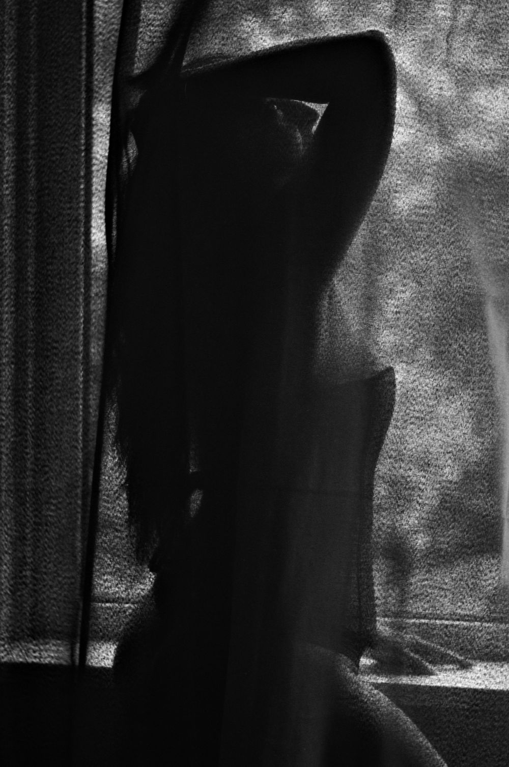 Fotografia boudoir elegante com iluminação suave e atmosfera íntima