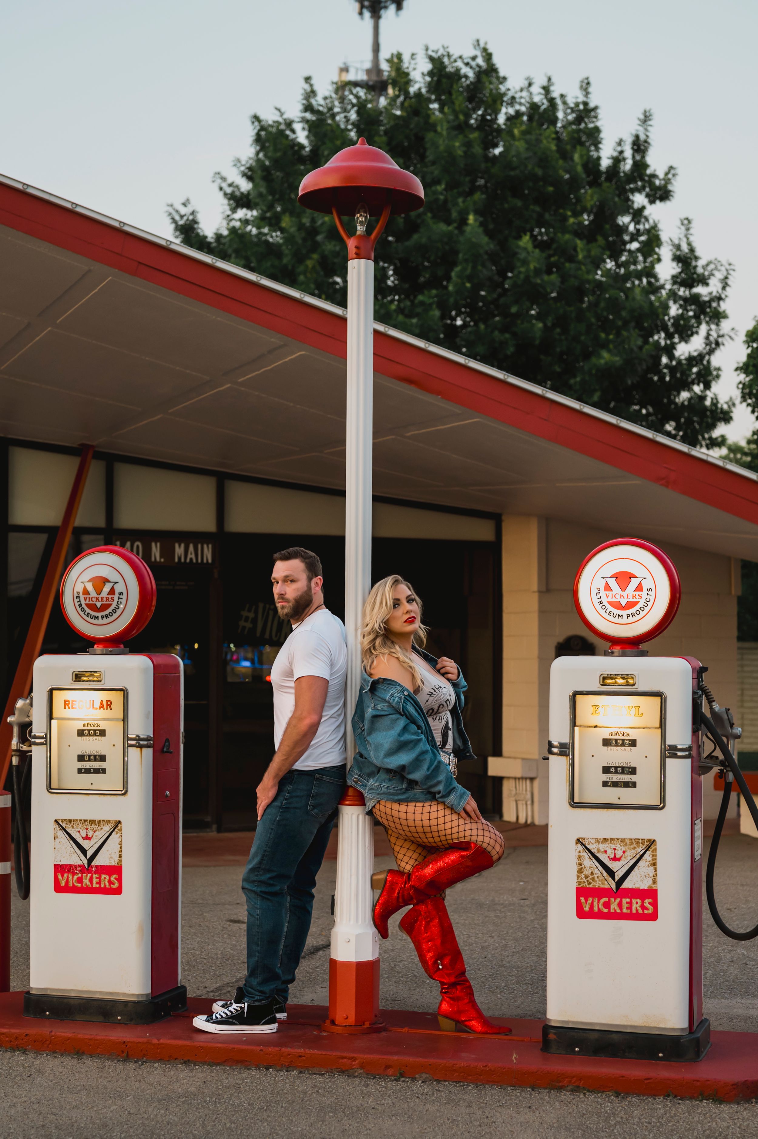 A vintage gas station scene with red and white retro fuel pumps captured from multiple angles at dusk.