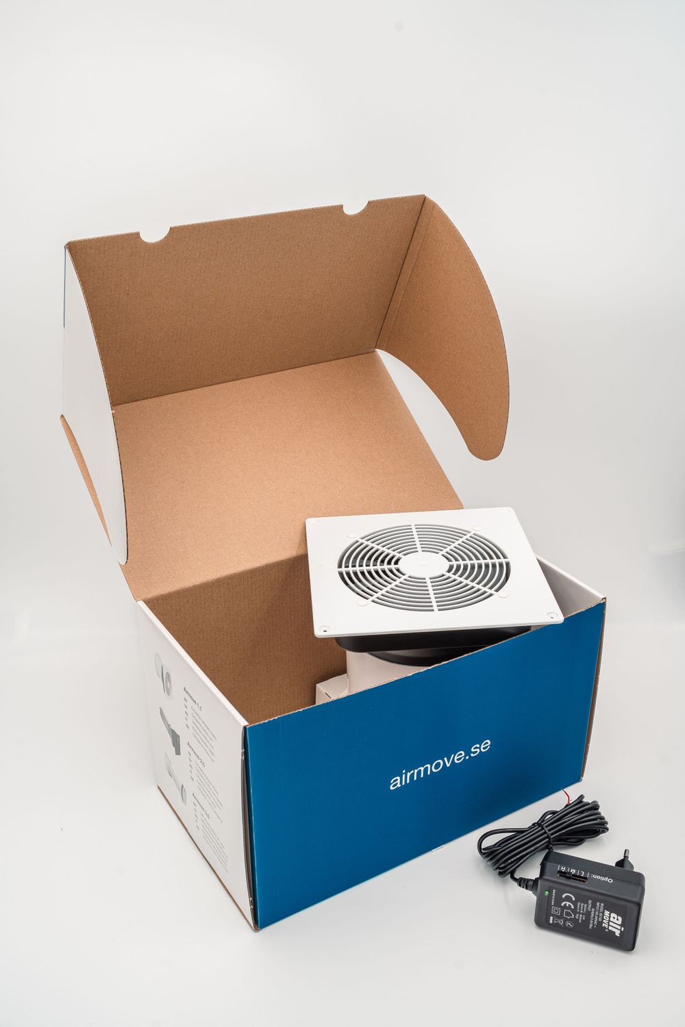 Product photography of a ventilation system component in branded packaging, ideal for e-commerce, marketing materials, and technical catalog