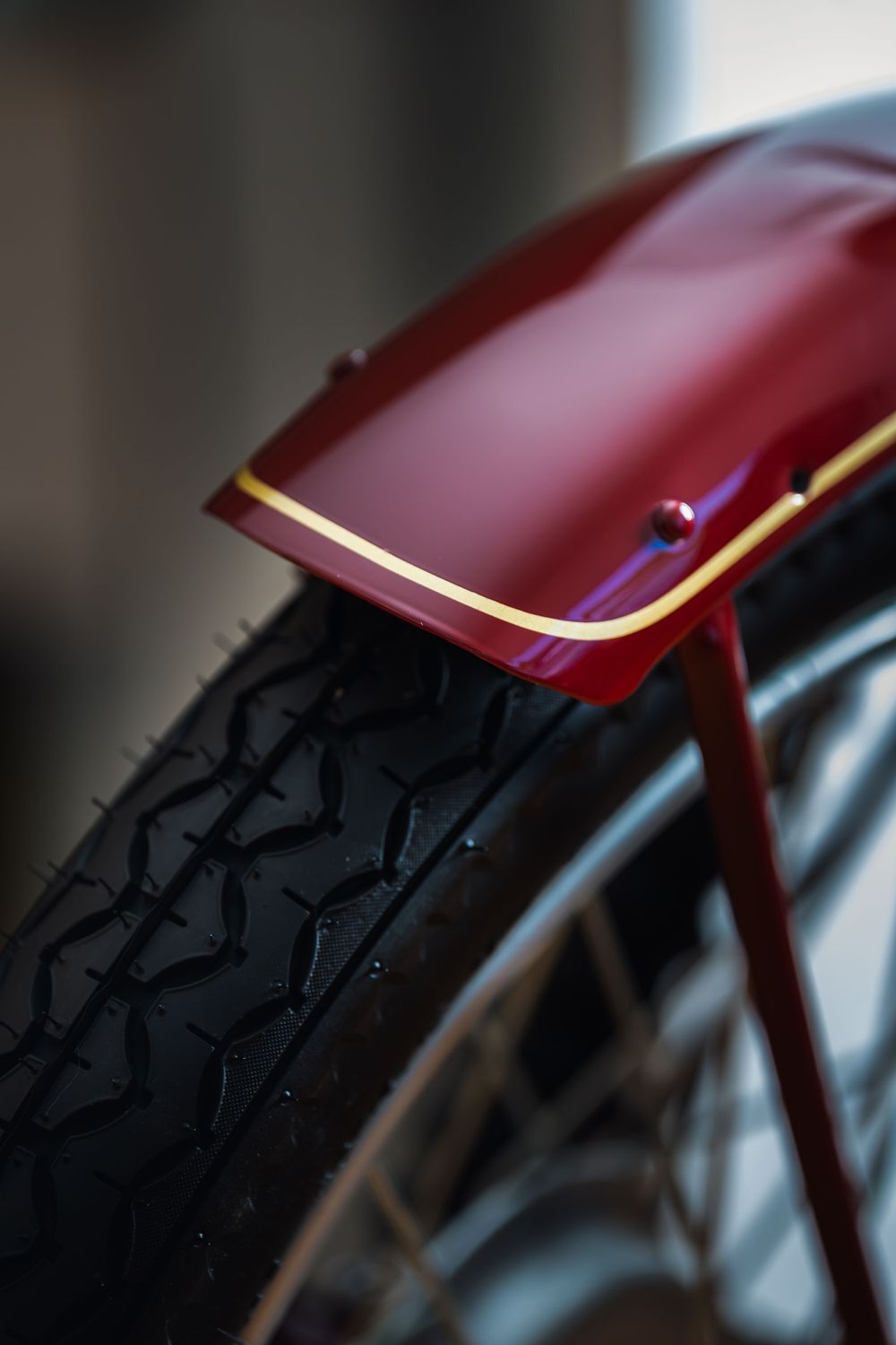 Detailed close-up of a sports car’s glossy paint, emphasizing premium craftsmanship. Great for automotive marketing and promotional visuals.