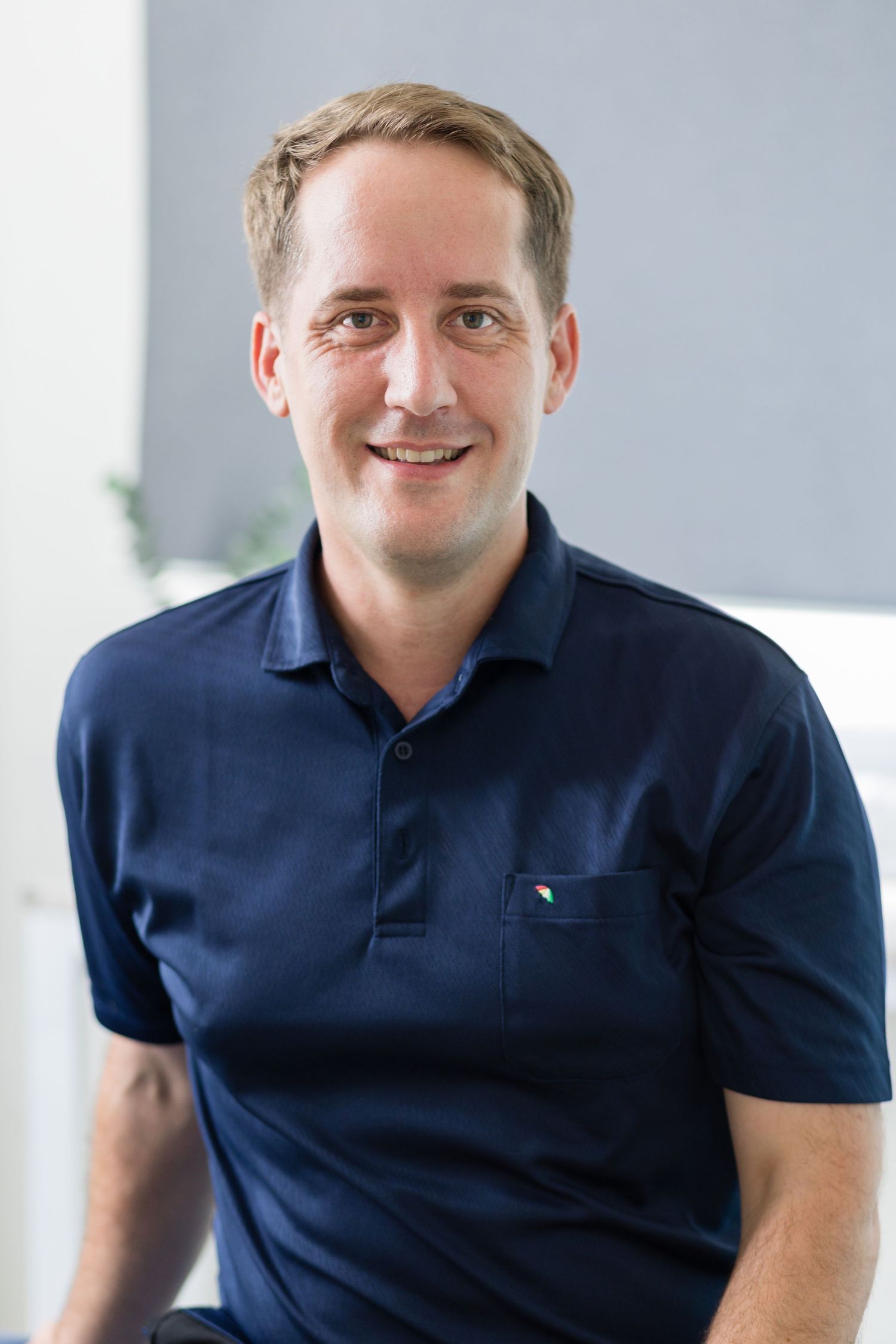 Wellness professional head shot in clinic in Singapore