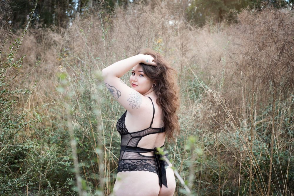 Outdoor Boudoir portrait session focusing on confidence and expression in Gainesville Florida at Celebration