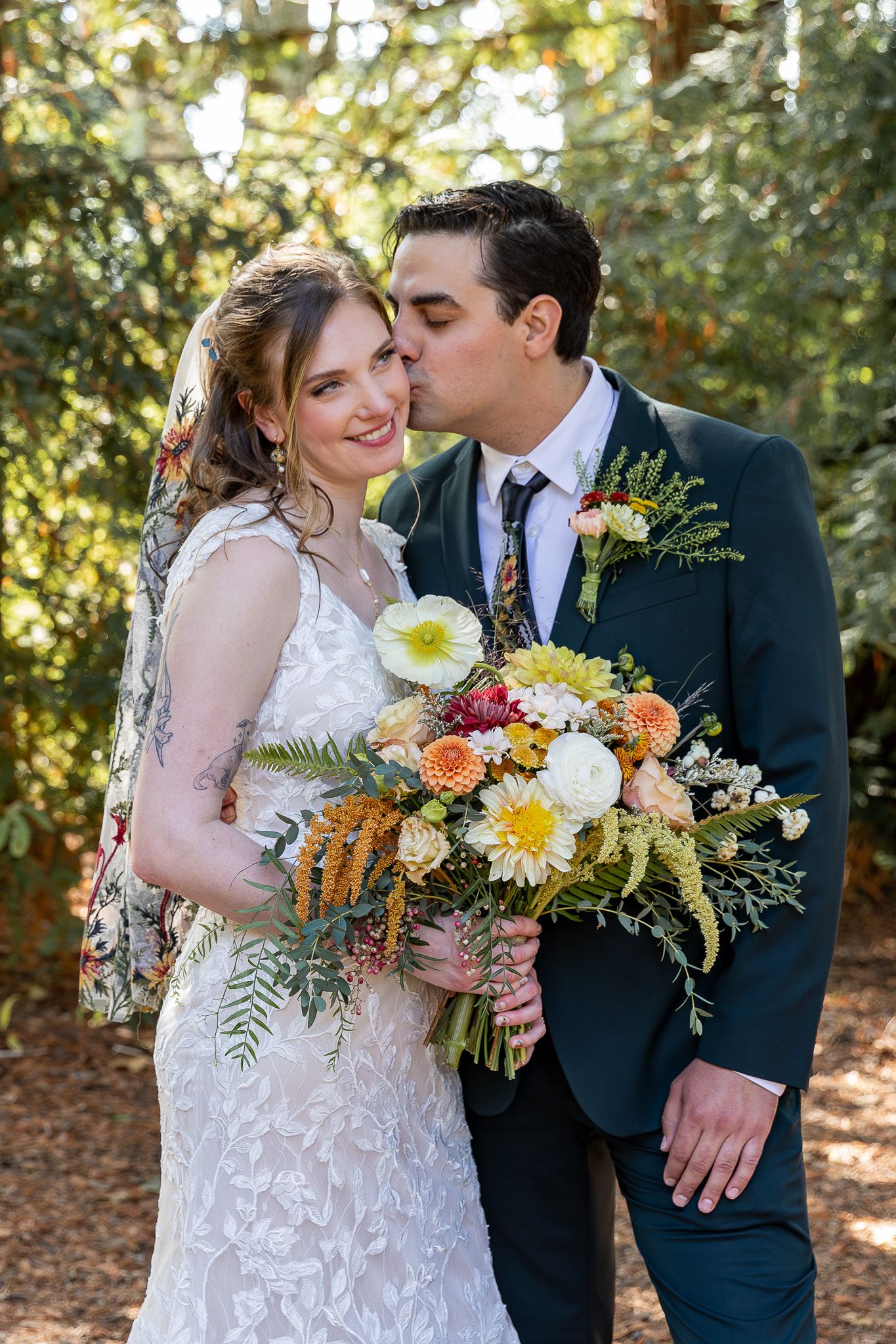Bride and groom celebrating with bridal party.