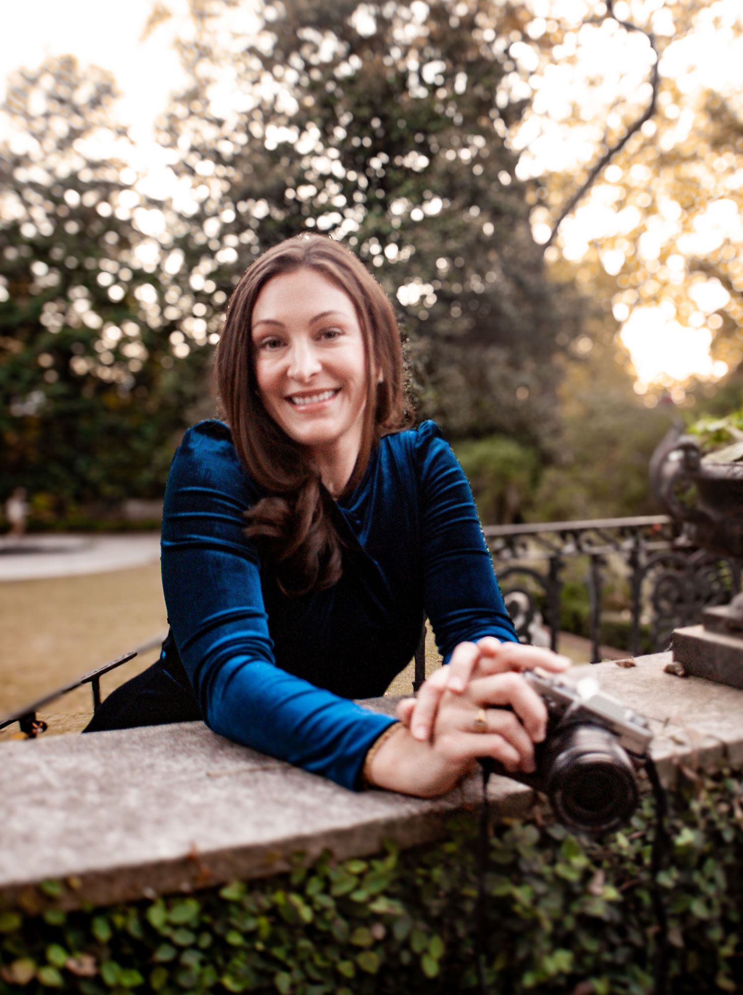 Professional lifestyle photoshoot of a local business owner  in Founders Garden at the UGA campus.