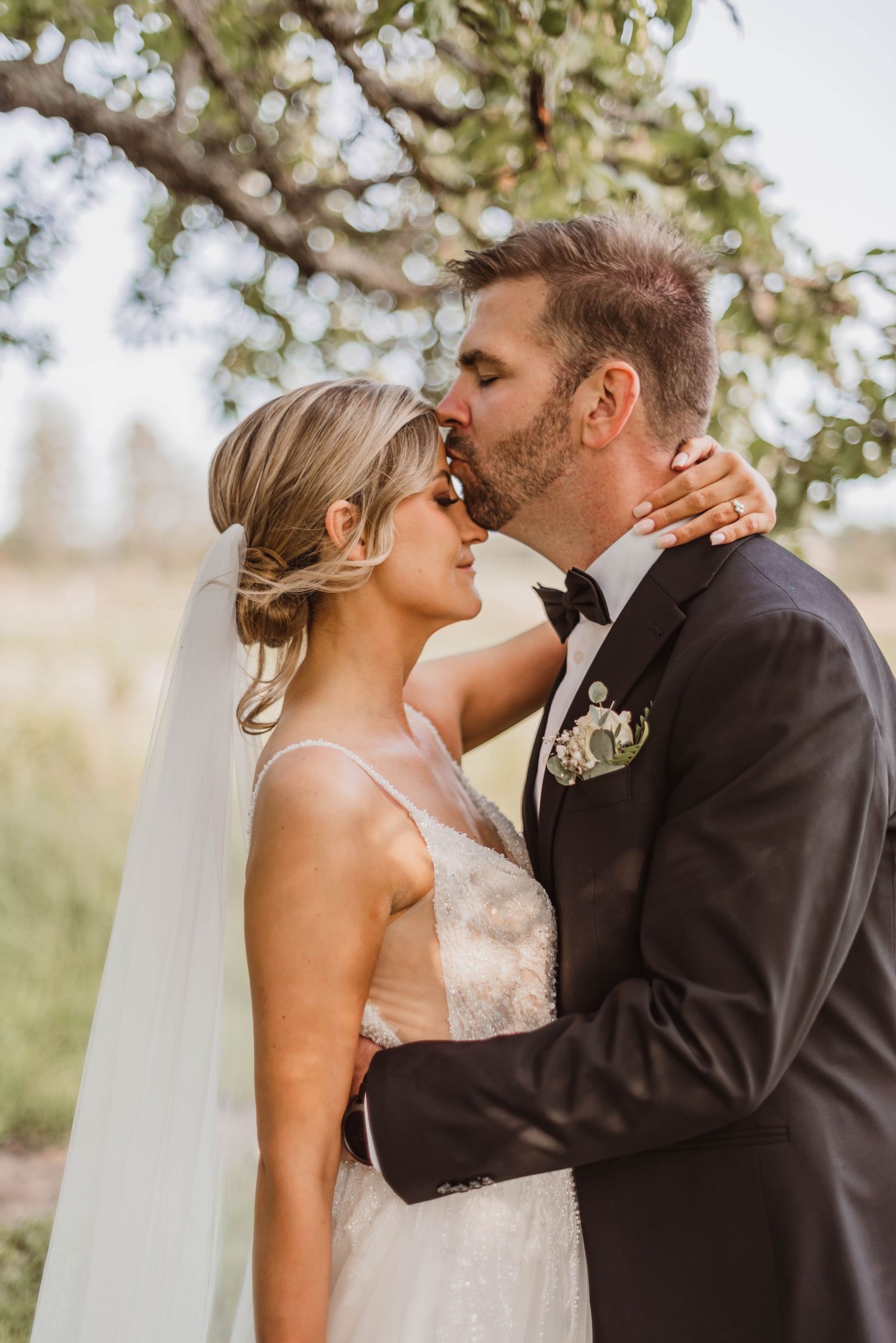 A romantic sequence of wedding photos showing tender moments between a bride and groom in an outdoor setting.