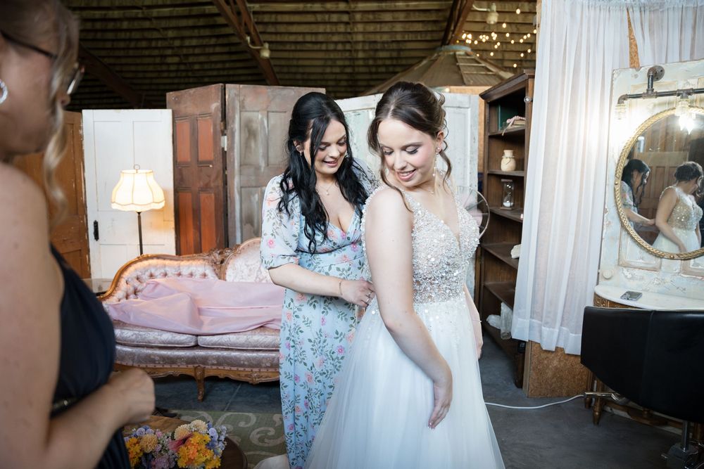 A series of vintage-style getting ready photos showing dress preparations in a sunlit room.