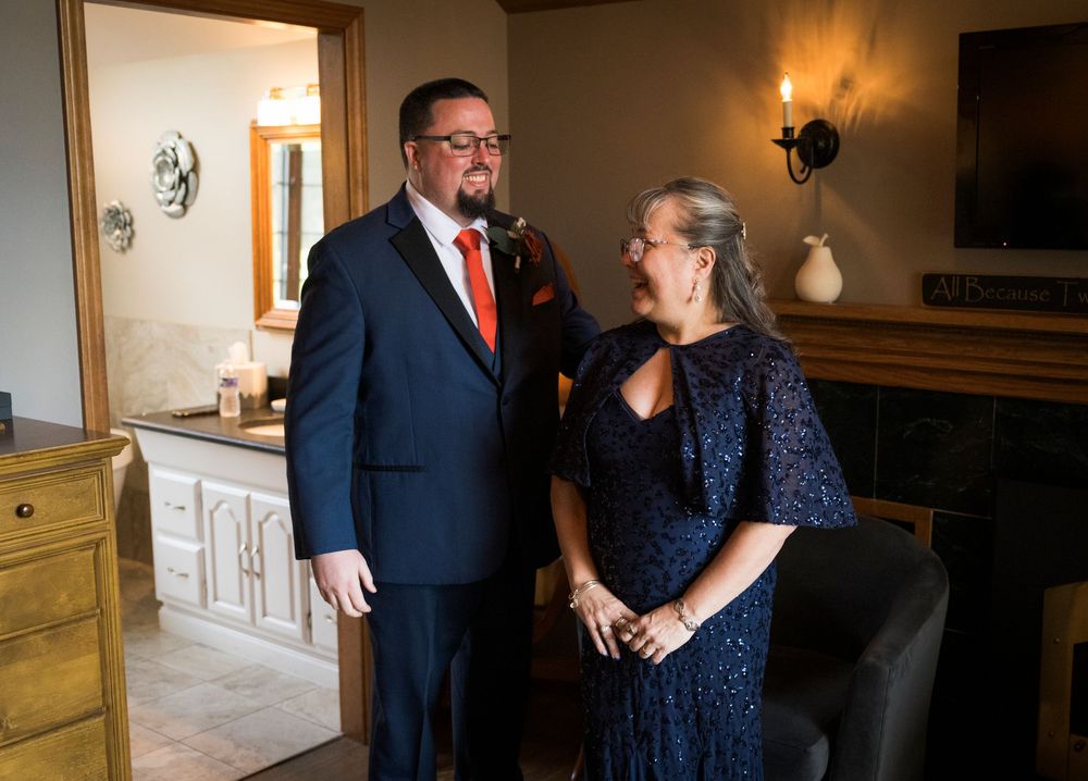 Indoor wedding venue with warm lighting and elegant decor creating intimate atmosphere.