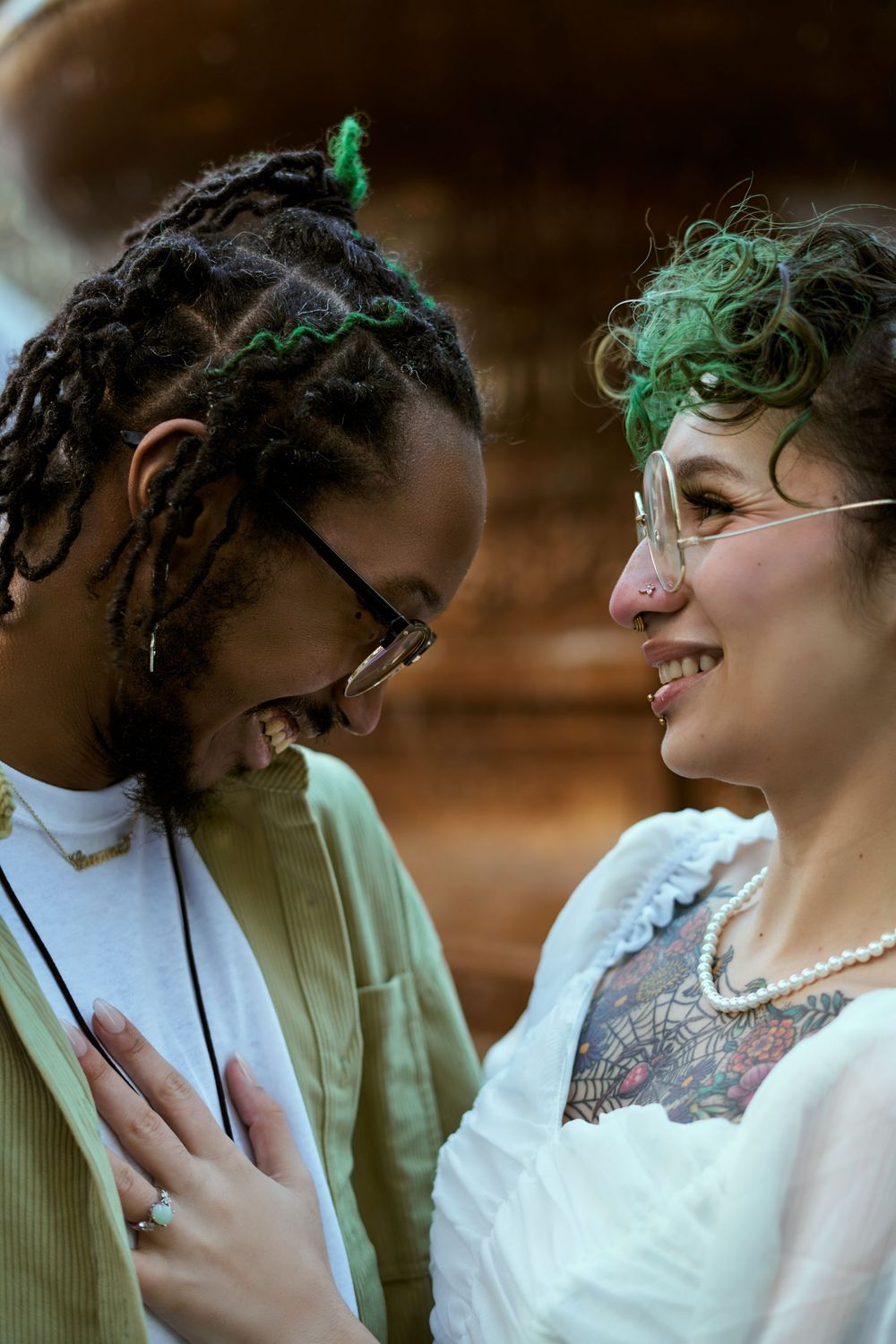 Romantic couple in vintage-inspired wedding attire share tender moments during their photo session outdoors. Engagement shoot Manhattan