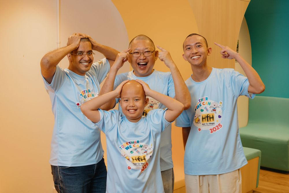 A series of four connected photos showing people in light blue t-shirts expressing joy and excitement against a green wall.