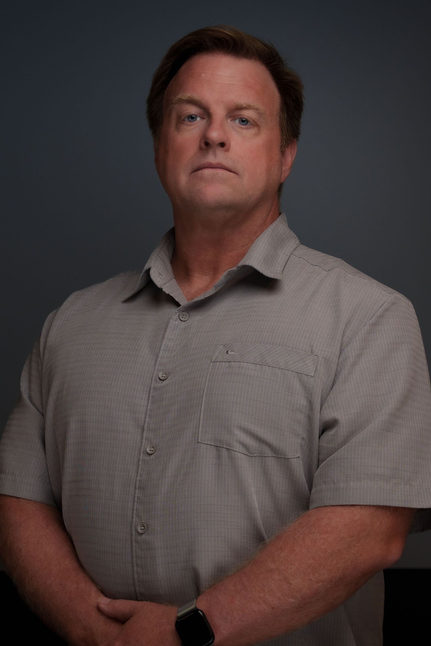 Cinematic portrait sequence showing different angles in muted lighting conditions.