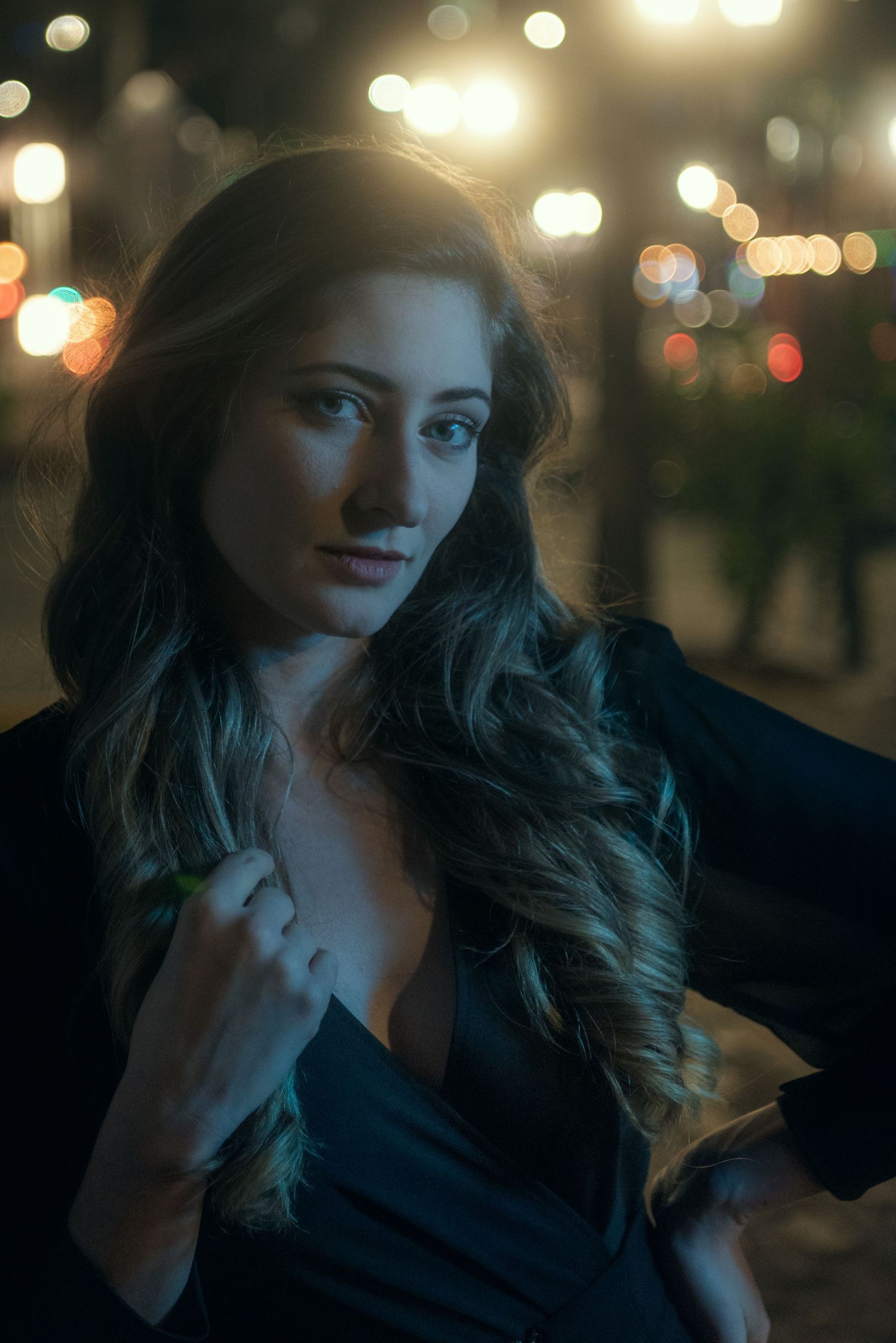 Cinematic night portrait session in Richmond VA inspired by downtown Orlando. Capture motion, light, and urban storytelling with a creative