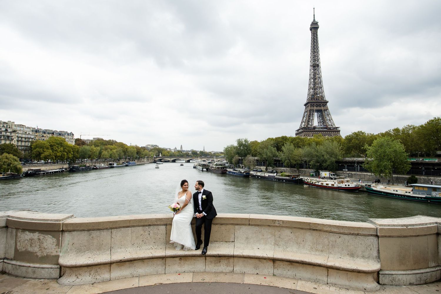 Panoramic series of scenic views along the Seine River in Paris with the iconic Eiffel Tower in the distance.