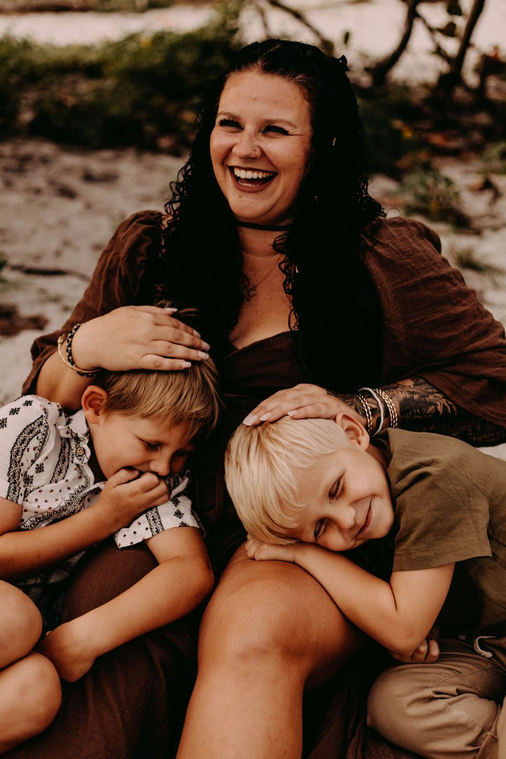 A heartwarming series of intimate family photos showing tender moments of embrace and connection in warm lighting.