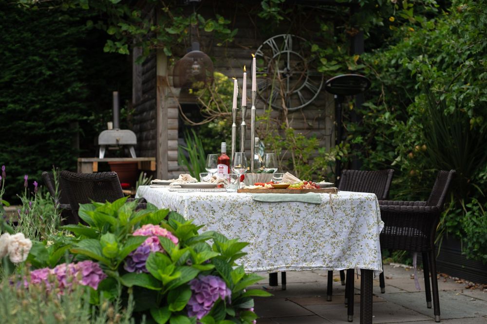 Brand photography of a styled outdoor dining table set for a garden event