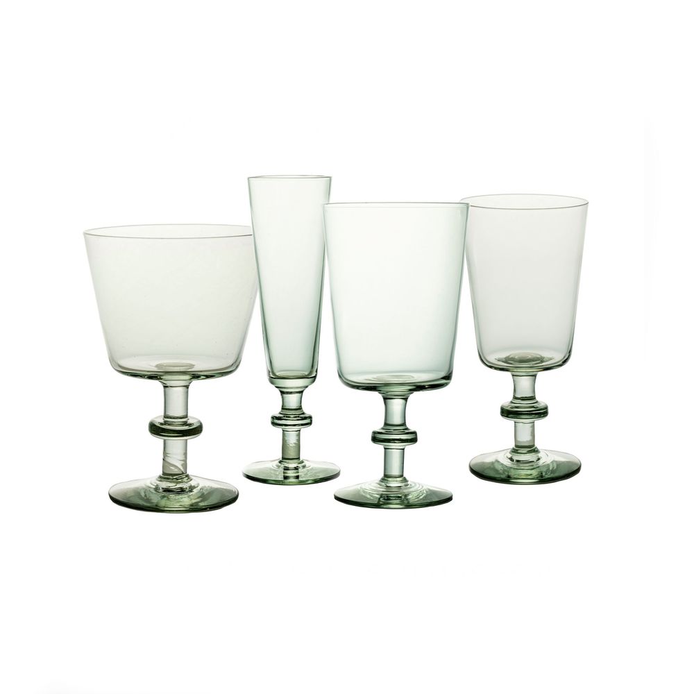 Product photography of green glass goblets on a white background