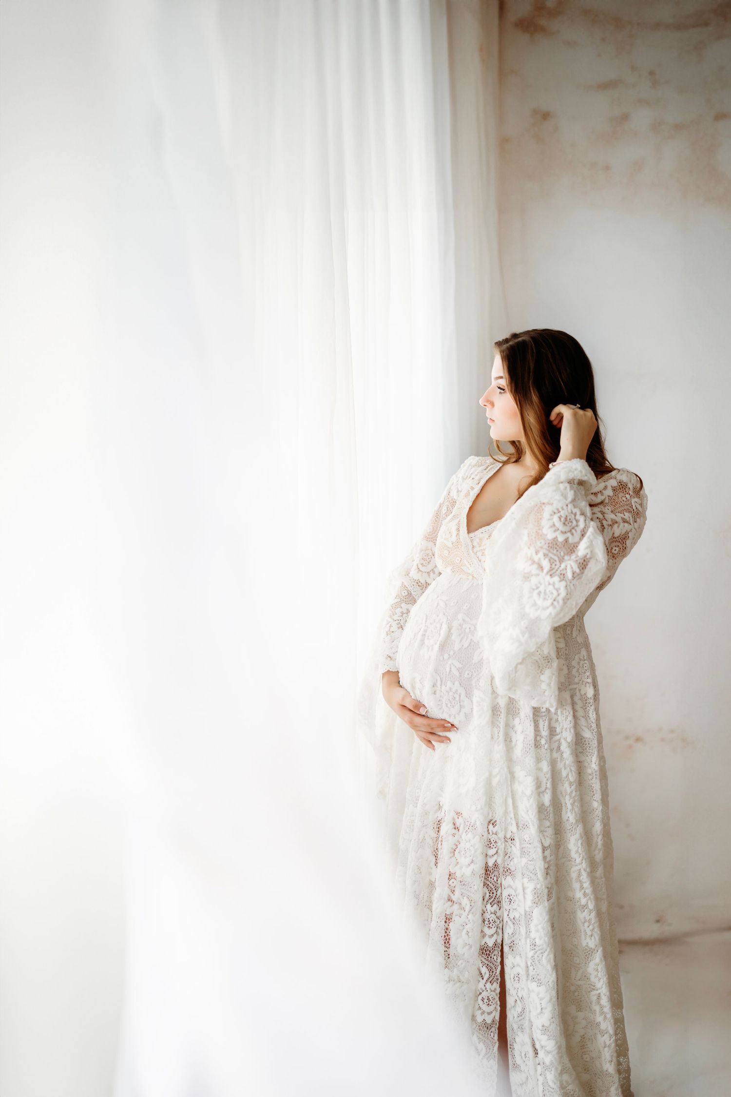 Mom to be maternity shoot romantic cream and white client closet dress professional photos Nashville photographer studio
