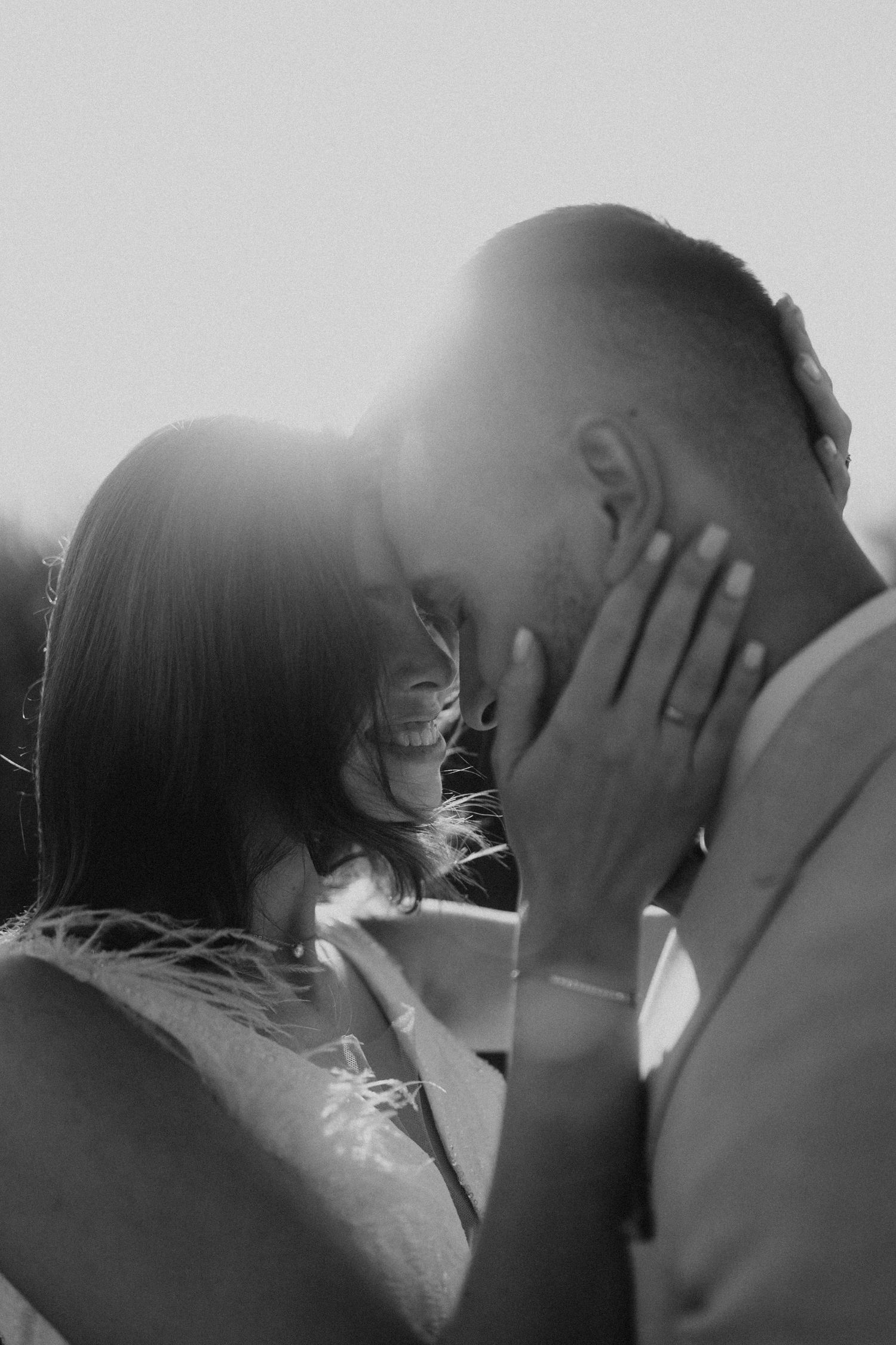 Artistic black and white photo series showing intimate emotional expressions with hands covering face.