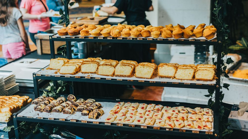 Assorted pastries and baked goods displayed on a catering table.