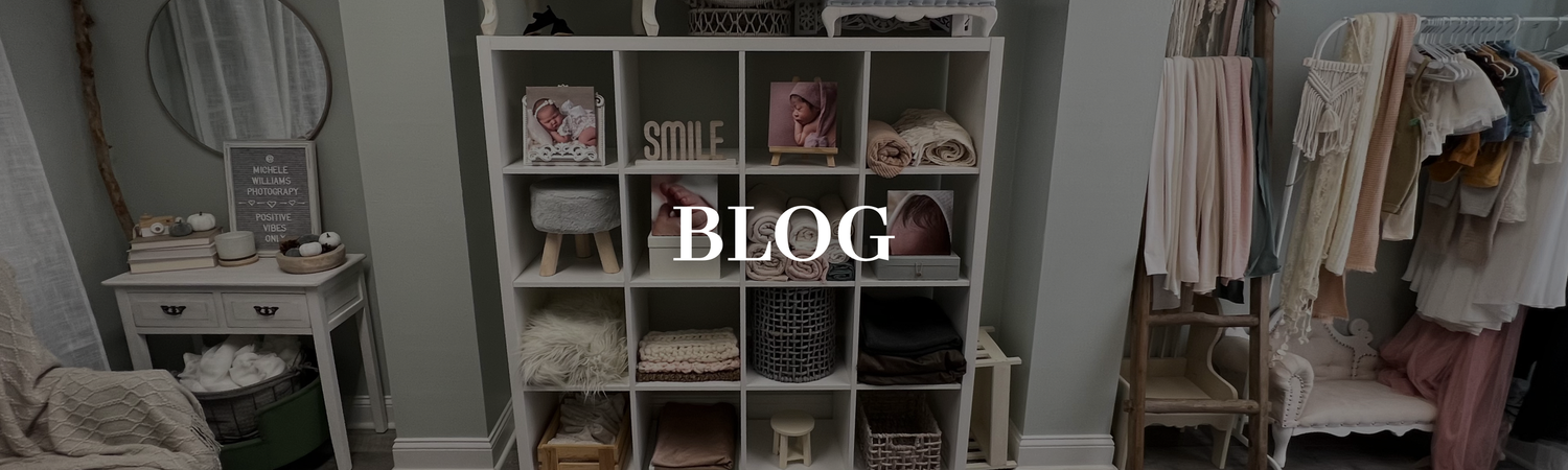 A cozy home office corner with bookshelves, clothing rack and modern decor in neutral tones.
