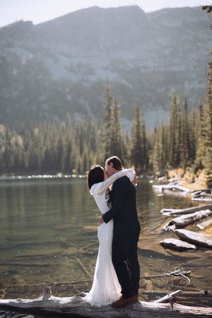 Couple exchanging vows during an intimate mountain elopement in North Idaho