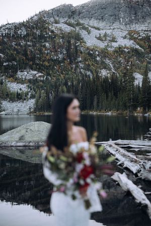 Couple exchanging vows during an intimate mountain elopement in North Idaho