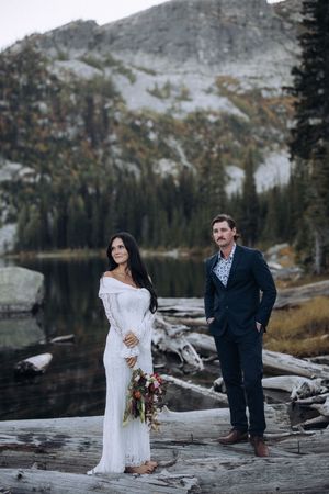 Couple exchanging vows during an intimate mountain elopement in North Idaho