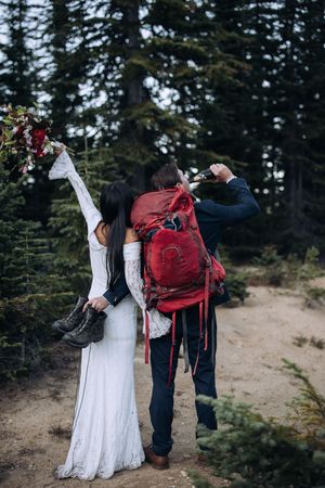 Couple exchanging vows during an intimate mountain elopement in North Idaho
