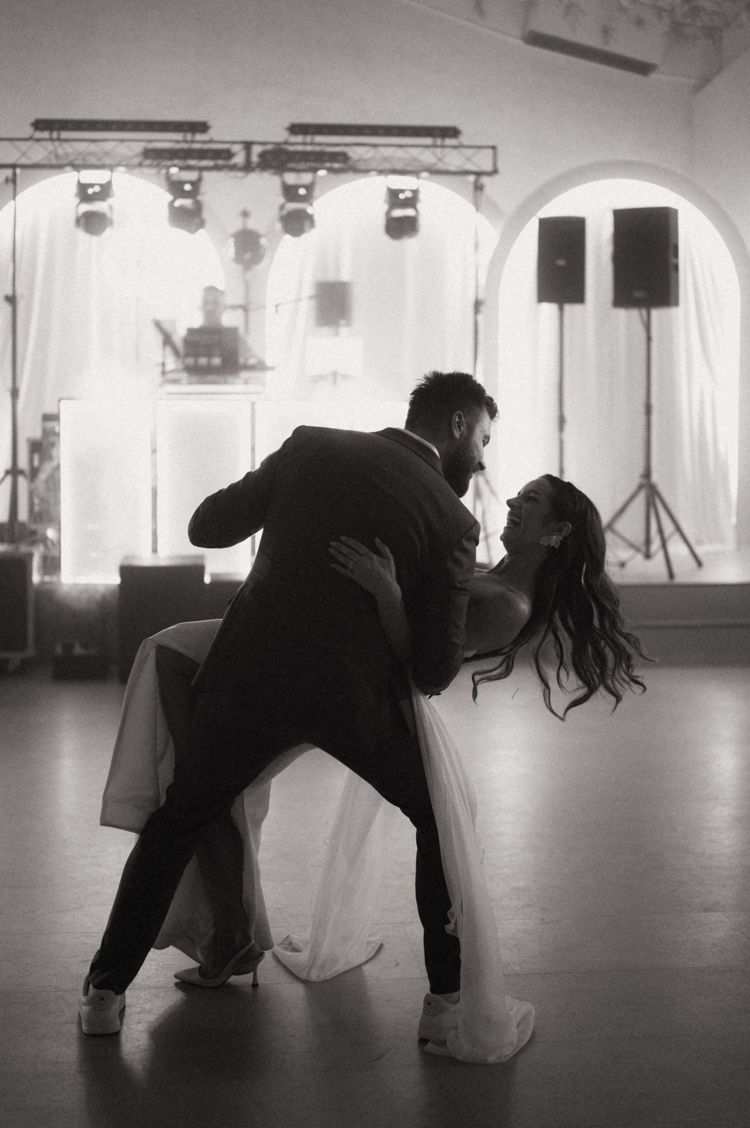 Black and white sequence showing dancers performing contemporary movements on a studio floor.