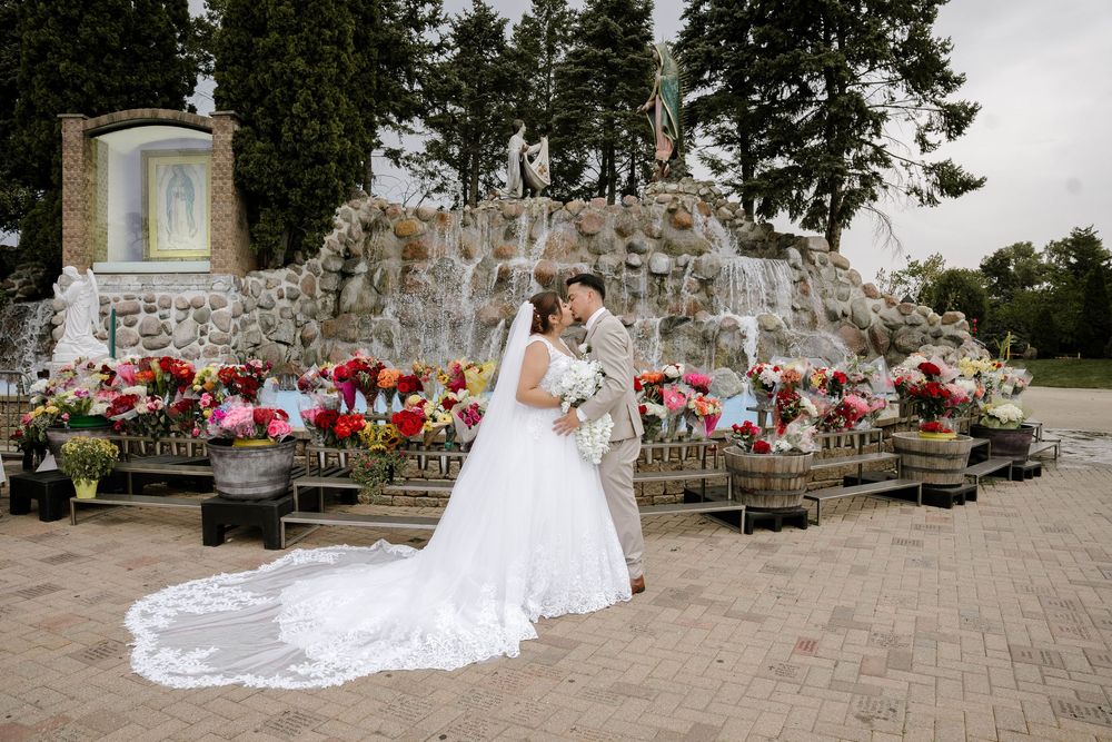 A sequence of wedding photos showing a white dress flowing across stone pavement with red flowers in the background.