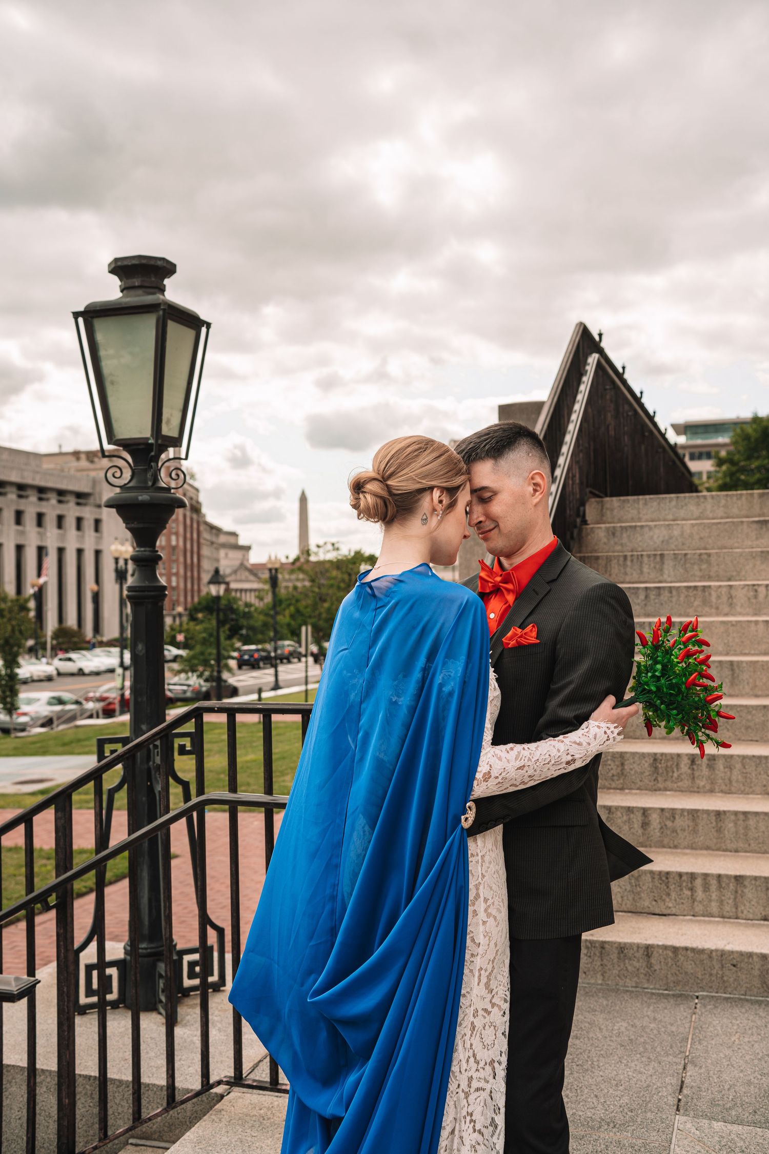 DC courthouse elopement couple outside the District of Columbia Building with bouquet | Washington DC wedding photographer.