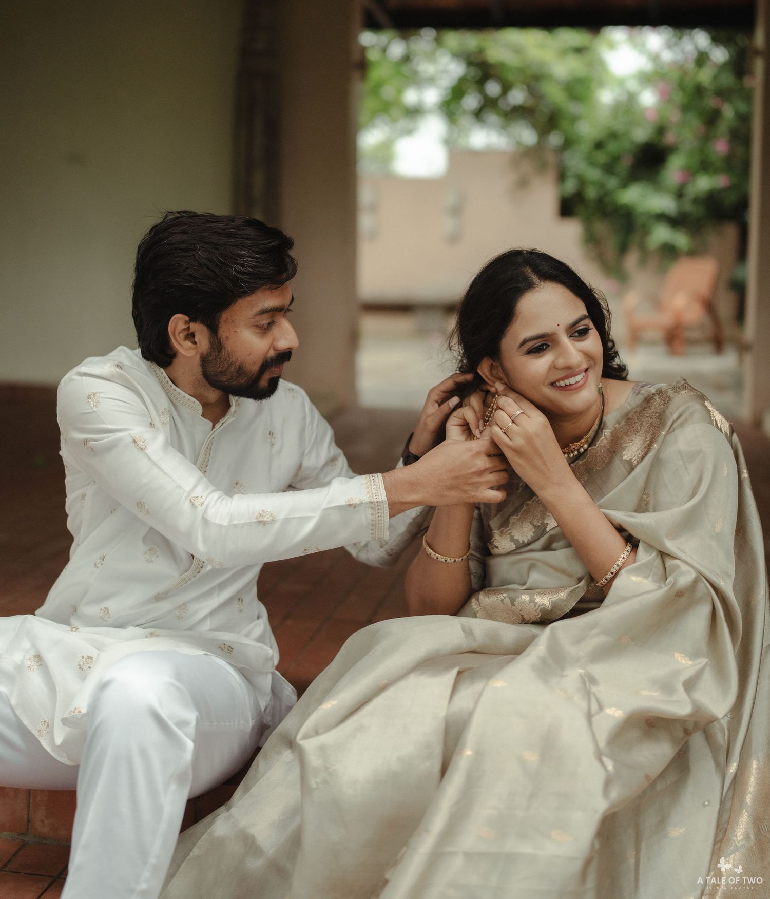 A romantic series of candid moments between a couple in white traditional outfits showing playful interactions.
