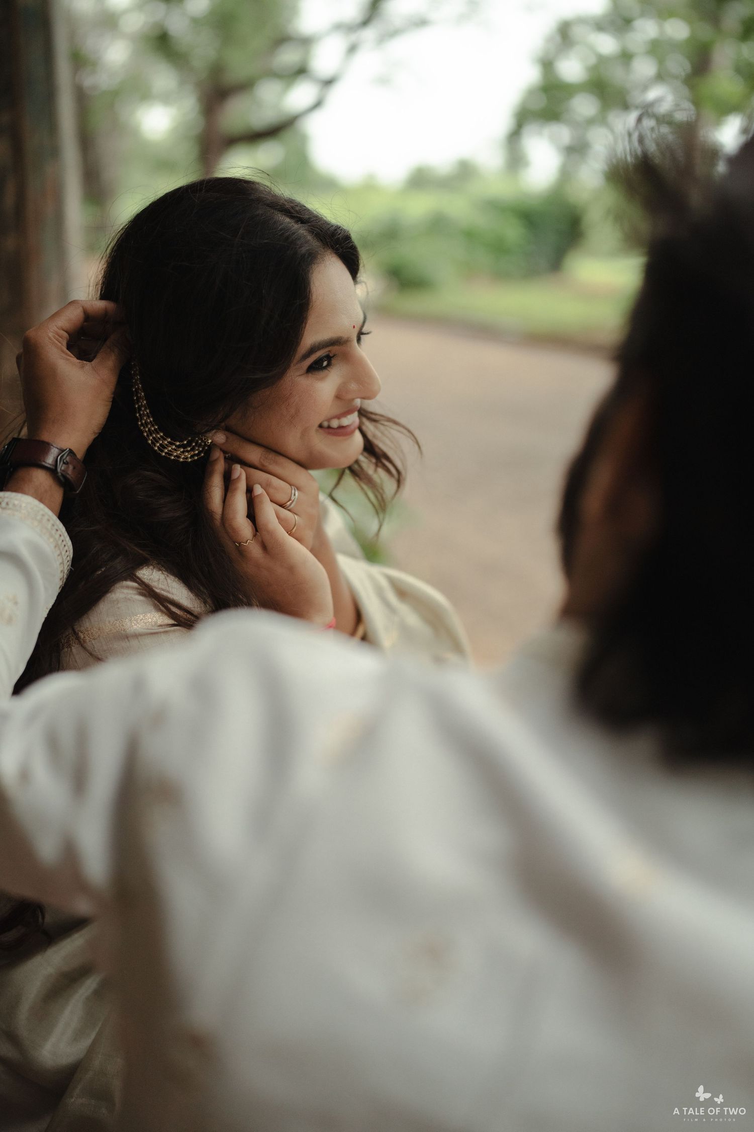 A romantic sequence of poses showing soft tender moments against a blurred outdoor background.
