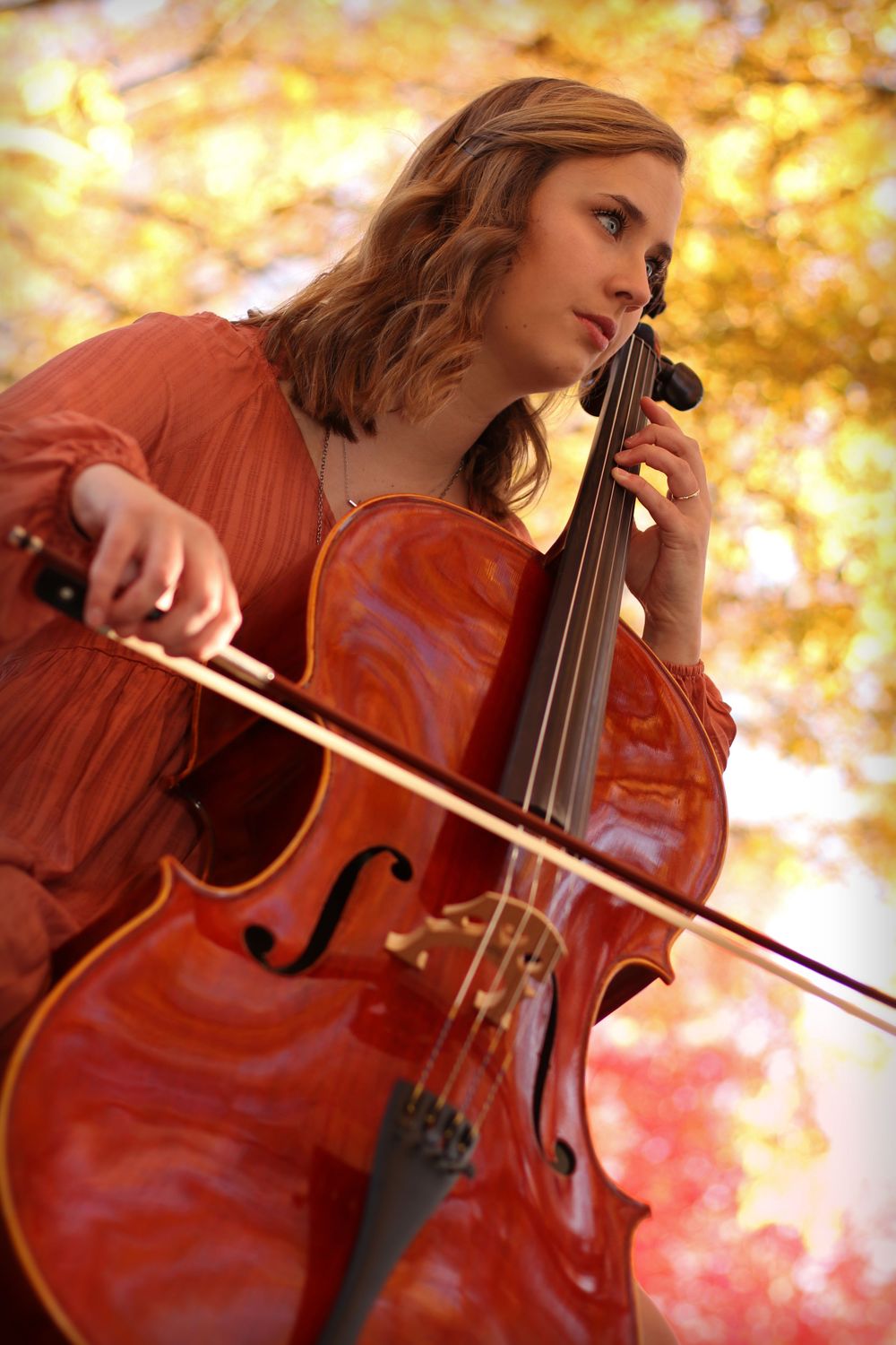 high school senior portrait with cello Old Town Conyers GA senior photographer