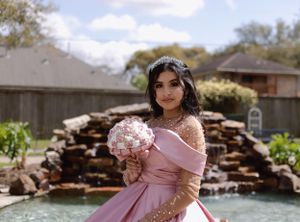 Sweet sixteen outdoor session/portrait of model showing the water cascade behind her.