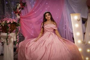 Sweet sixteen outdoor session/portrait of model just sitting her quince throne.