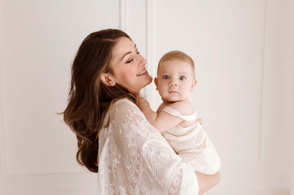 fotografia di una mamma con il suo piccolo