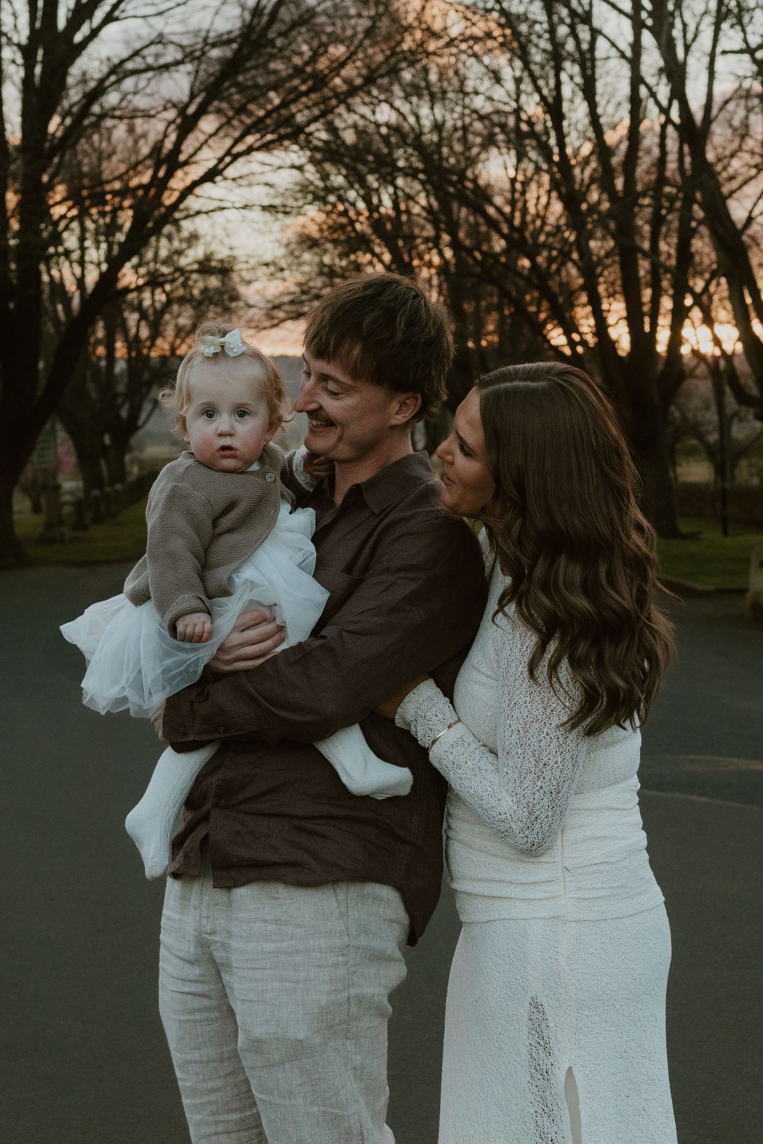 Family photoshoot at the beach during golden hour
