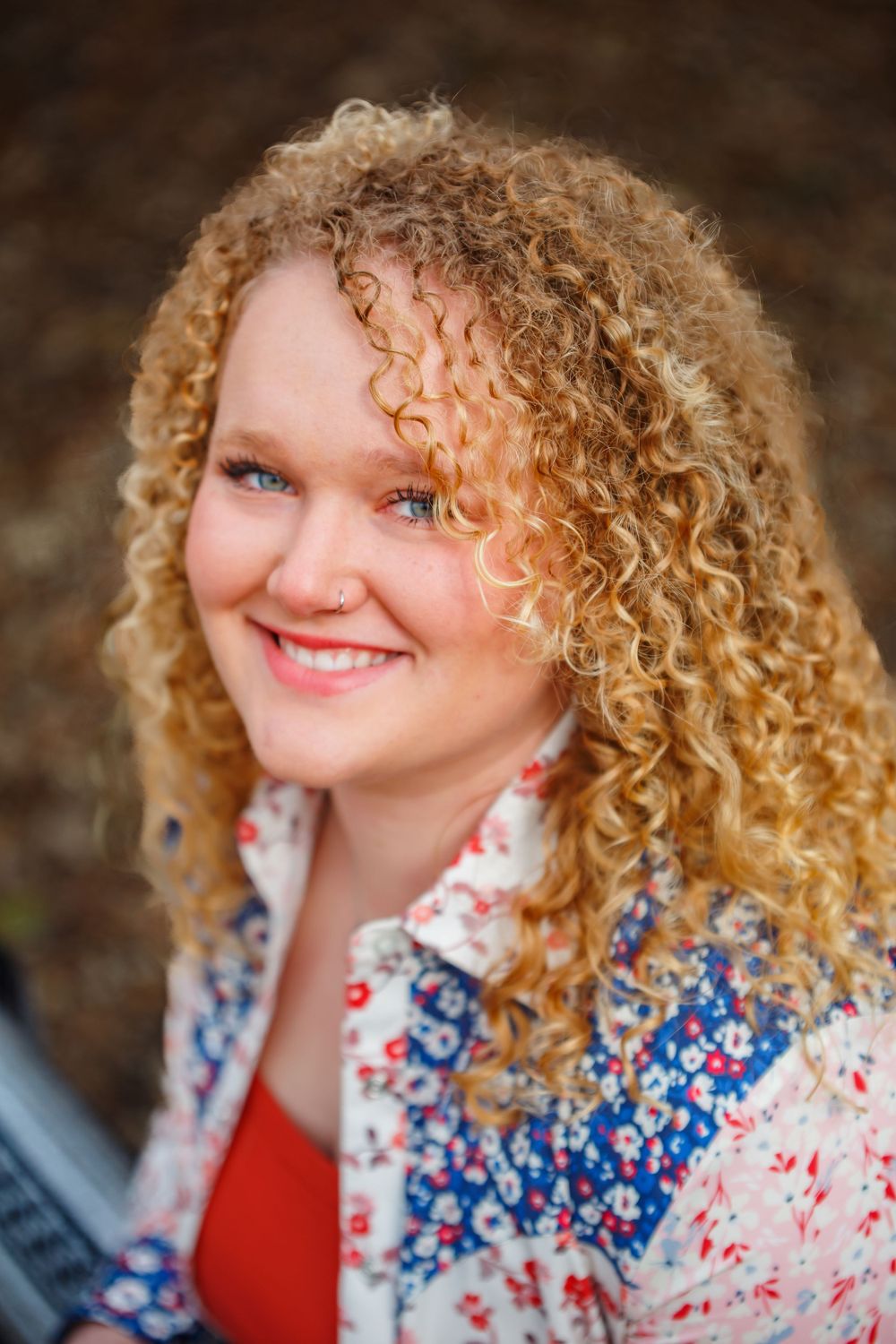 Close-up portrait series showing curly blonde hair and a floral print top against a dark background.