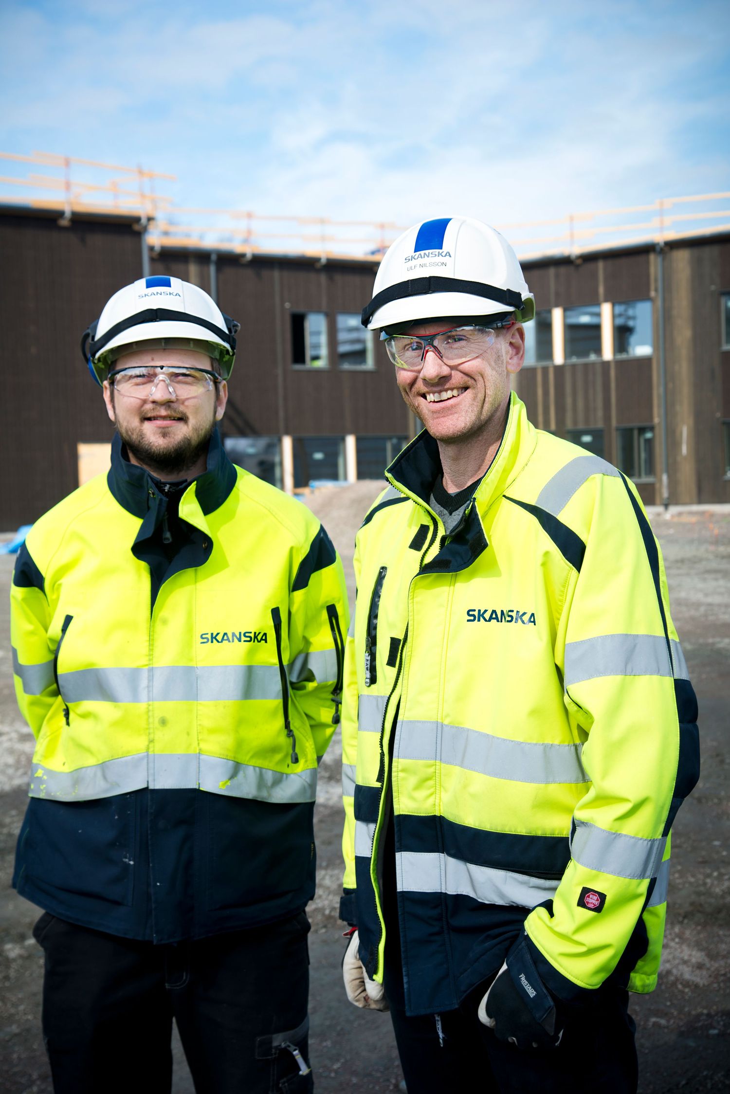 Porträtt på byggnadsarbetare när ny skola byggdes i Karlstad. Fotograf Rebecca Nordin.